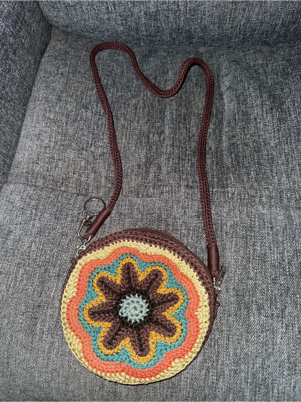 The Sak Round Crochet Crossbody Bag in Brown, Orange, Teal, Cream